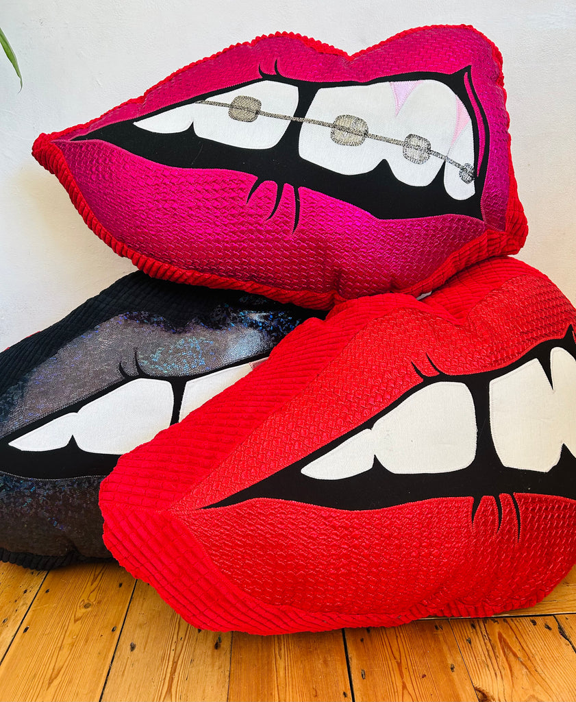 One Off Supersized Bite Back Cushion - Pink and Red with braces