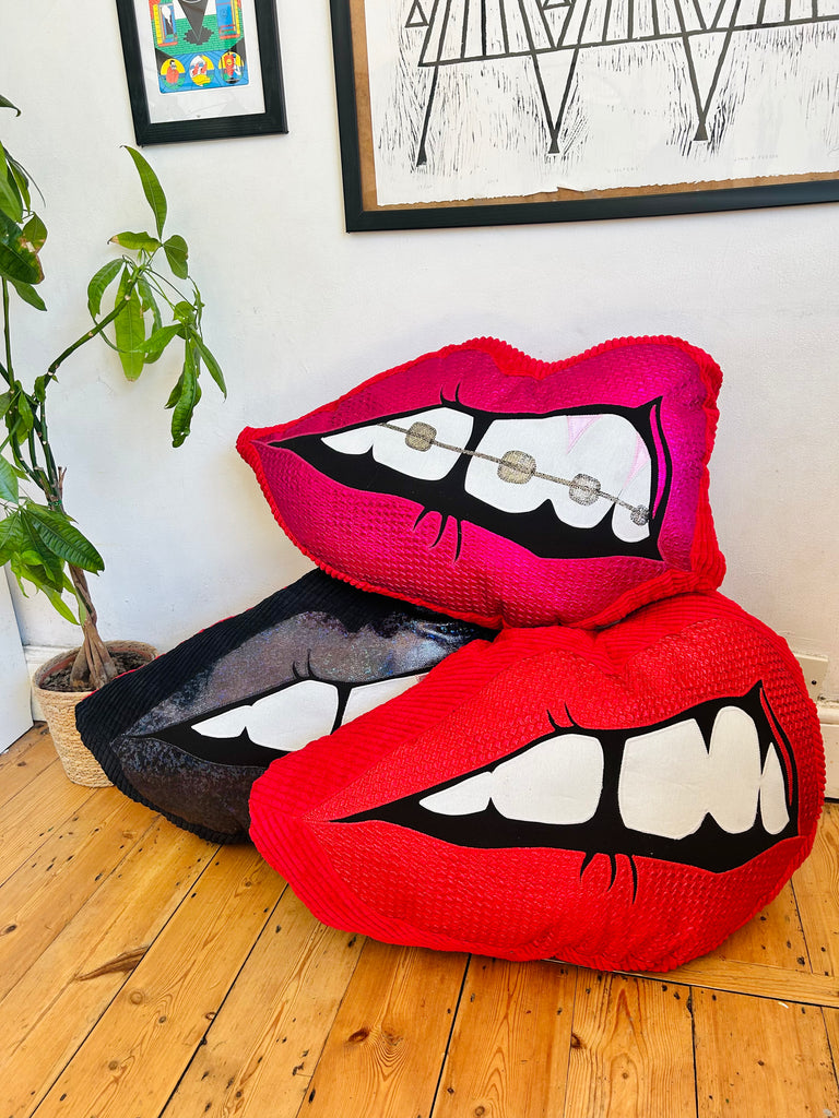 One Off Supersized Bite Back Cushion - Pink and Red with braces