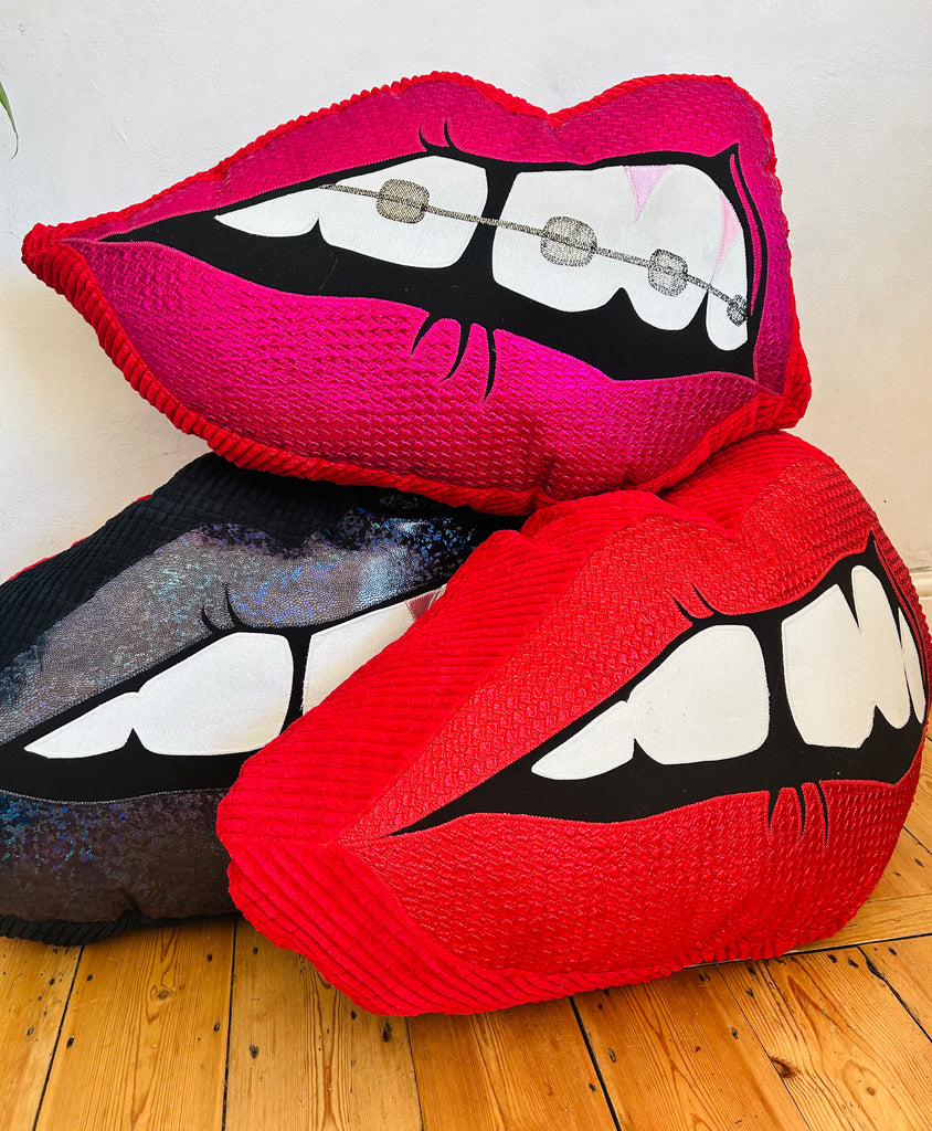 One Off Supersized Bite Back Cushion - Pink and Red with braces